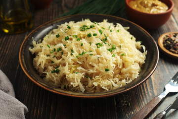 A bowl with traditional German Sauerkraut served in rustic style	