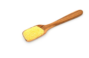 Uncooked cornmeal maize flour heap in a spoon isolated on white background