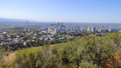 Fototapeta premium A view of Almaty seen from the mountains of Kazakhstan outside the city