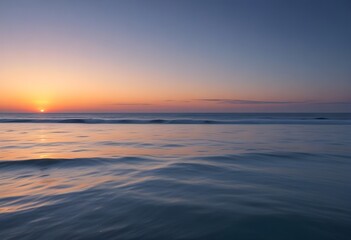 sunset over the sea, sand beach, summer day, some clouds, pink light