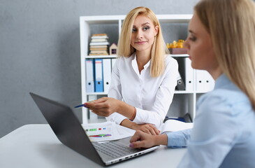 Group of people deliberate on white laptop problem in office portrait. Graph consult idea participate creative talk review situation job client document explain train successful decision concept