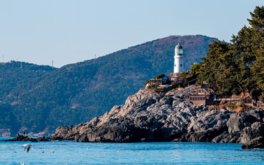 Landscape view of lighthouse in Haeundae beach, Busan, South Korea.