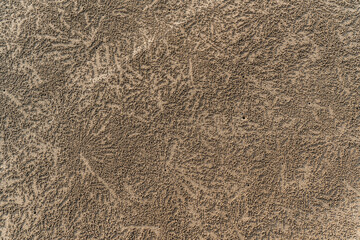 Unique sand texture -  patterns created by sand bubbler crabs on the beach