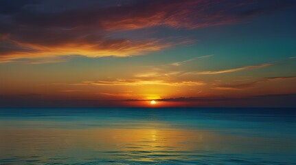 Obraz premium Teal blue with oranges and yellows above the ocean horizon.generative.ai