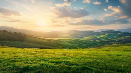 Obraz premium Beautiful sunrise over rolling green hills with a bright sun and clear sky. The image captures a serene natural landscape perfect for backgrounds, nature-themed designs, and relaxation visuals. AI