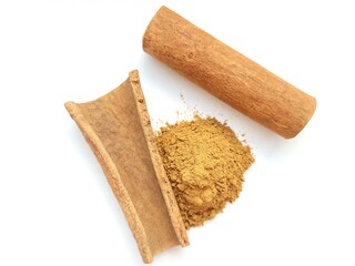 Cinnamon sticks and aromatic powder on a white background.