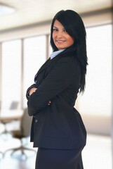 Young Woman Doing Business in Office