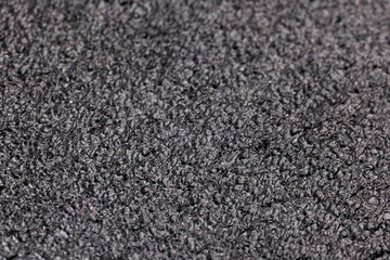 Black high-impact closed-cell polyethylene black foam closeup full-frame view. Specifically designed packing material.