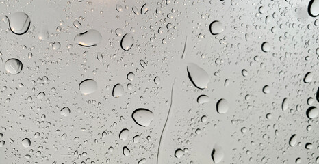 Water droplets on window after rain day suitable for wallpaper or design