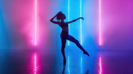 Modern dance girl dancer dancing in neon light doing gymnastic exercises in studio, copy space.