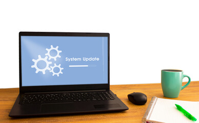 System update notification on laptop screen on work desk. System update or upgrade alert for any...