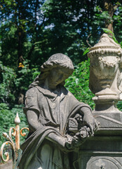 Marble statue of a woman. Marble statue in the cemetery