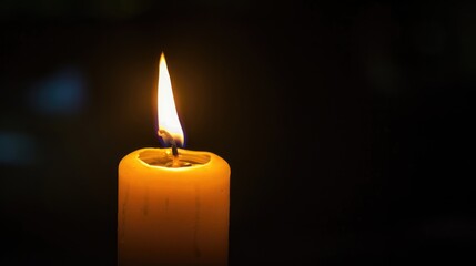 Evocative candle flame casting a warm glow against a dark canvas, symbolizing resilience and inner strength