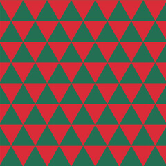 Geometric seamless pattern.Triangle repeat pattern in green and red for Christmas.Abstract graphic vector background.