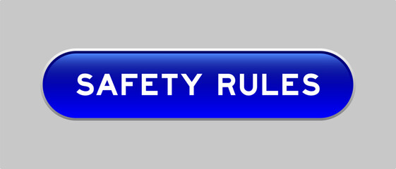 Fototapeta premium Blue color capsule shape button with word safety rules on gray background