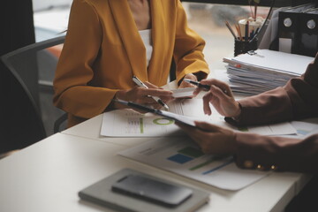 Team of business people working together in the meeting room office, teamwork background charts and graphs banner, double exposure successful teamwork,business planning concept.