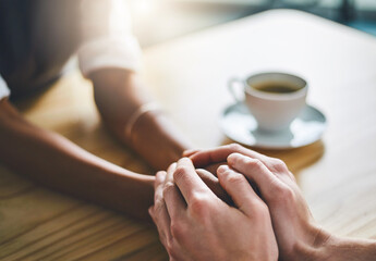 Empathy, holding hands and support on table for business, solidarity and of partner in company and...