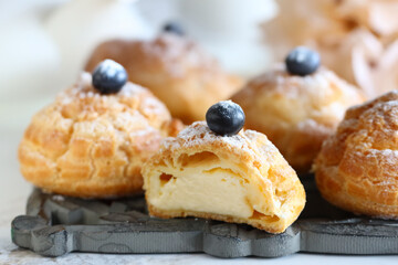 traditional choux pastry eclair dessert on a plate