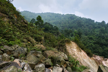 River with Abundant Rocks Near the Waterfall