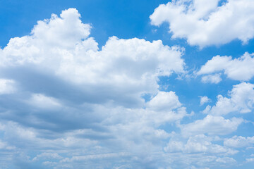 Blue Sky with White Clouds and Sunlight
