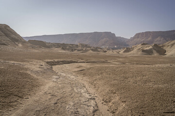 The arid dry rocks of Judean desert in the area of Masada national park in eastern Israel, on the border with Palestinian West Bank.
