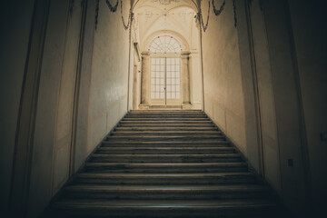 Ancient dark staircase - Grunge interior, nobody, empty building architecture, window.