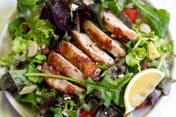 Roasted chicken with salad, delicious and healthy meal.