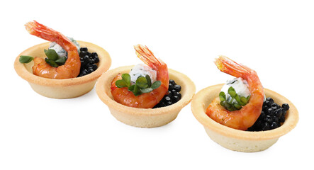 Delicious canapes with shrimps and black caviar isolated on white