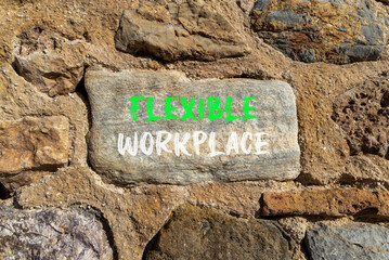 Flexible workplace symbol. Concept words Flexible workplace on beautiful grey stone. Beautiful...