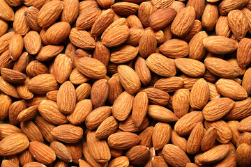 Creative layout made of almond nuts. Flat lay. Food concept. Almond pattern concept.