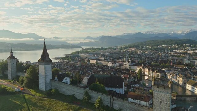 view of the city of Lucerne, Musegg Wall ( Museggmauer ) in Switzerland - Aerial Drone Video 