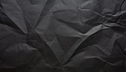 Fototapeta premium crumpled black office craft sheet paper, abstract minimalist luxury texture background wallpaper with space for copy and presentation, waste recycling