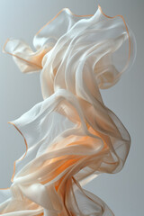 Fototapeta premium Close-up of a piece of lightweight, flowing fabric gently twirling in mid-air on a clean white background,