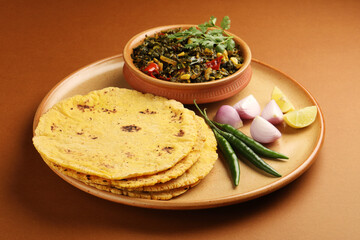 Makki Ki Roti & Sarson Ka Sag is basically Corn floor flat bread & curry using mustard greens respectively. Popular Punjabi food. 