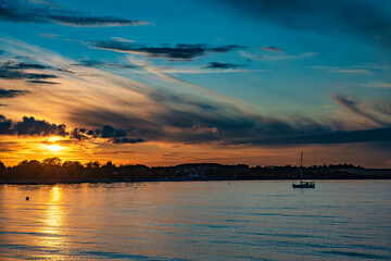 Naklejka premium Colorful sunset on the beach of Boltenhagen on the Baltic Sea