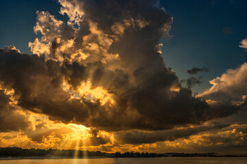 Huge cloud during a colorful sunset on the beach of Boltenhagen on the Baltic Sea