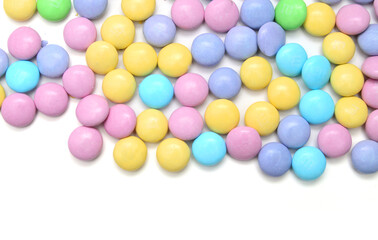 Closeup of colorful chocolate candies on white