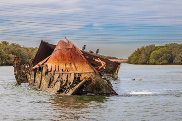 Exposure of Shipwreck location in Adelaide, were you can find several vessels been eaten by rust, Garden Island Ships' Graveyard, Adelaide, Australia.