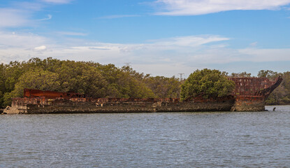 Fototapeta premium Exposure of Shipwreck location in Adelaide, were you can find several vessels been eaten by rust, Garden Island Ships' Graveyard, Adelaide, Australia.