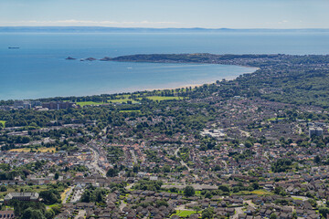 Aerial helicopter views over Swansea, Mumbles and the Gower Peninsular, Wales, UK
