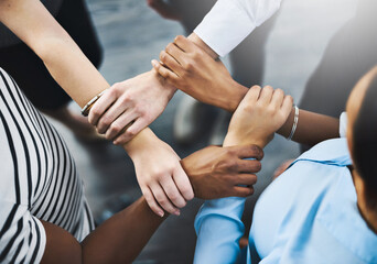 Business, people and holding hands in meeting, unity and deal of merger of company and solidarity....