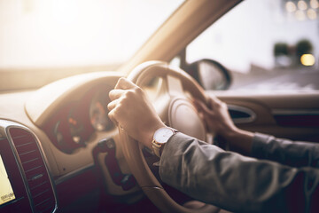 Hands, car and person on steering wheel with drive on road and travel for work or job. Service,...
