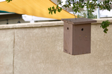wooden birdhouse feeder