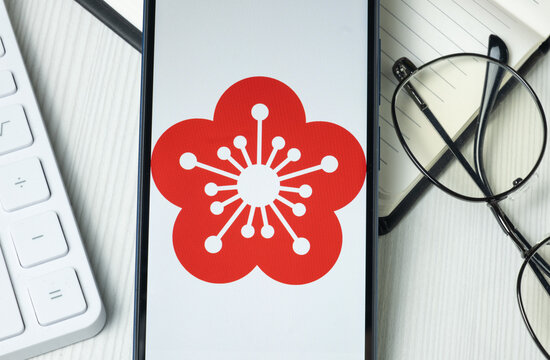 New York, USA - 21 June 2024: Orient Overseas Container Line Logo on Phone Screen, Company Icon