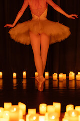 balerina dancing on stage with lots of candles © Ruslan
