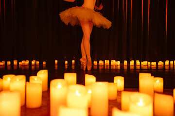 balerina dancing on stage with lots of candles © Ruslan
