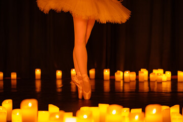 balerina dancing on stage with lots of candles © Ruslan