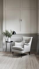 Fototapeta premium A modern, minimalist interior design with a white door, a grey armchair, and a grey sofa