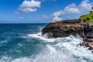 Waves hitting the Lava rock, Makahuena Light, Koloa, Kauai South Shore,Hawaii. Koloa Volcanics ,basalt