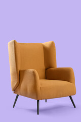 Beautiful brown armchair on lilac background